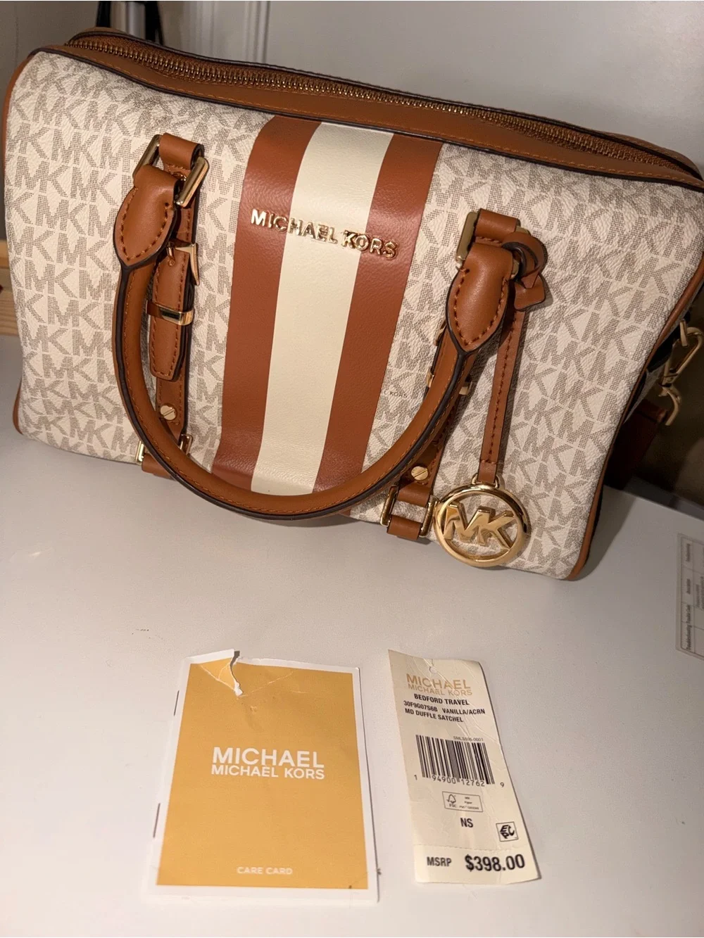 Michael Kors Tan and White Signature Stripe Satchel